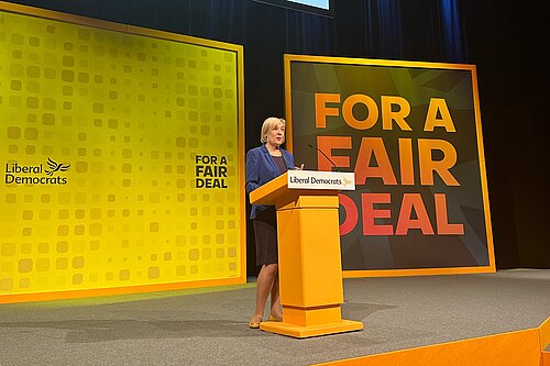 Lisa Smart giving the keynote address at the Lib Dem Conference