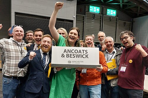 Manchester Lib Dems celebrating Cllr Chris Northwood's win at the count.