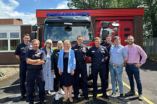 Lisa Smart meets members of the Offerton fire crew together with local Liberal Democrat councillors